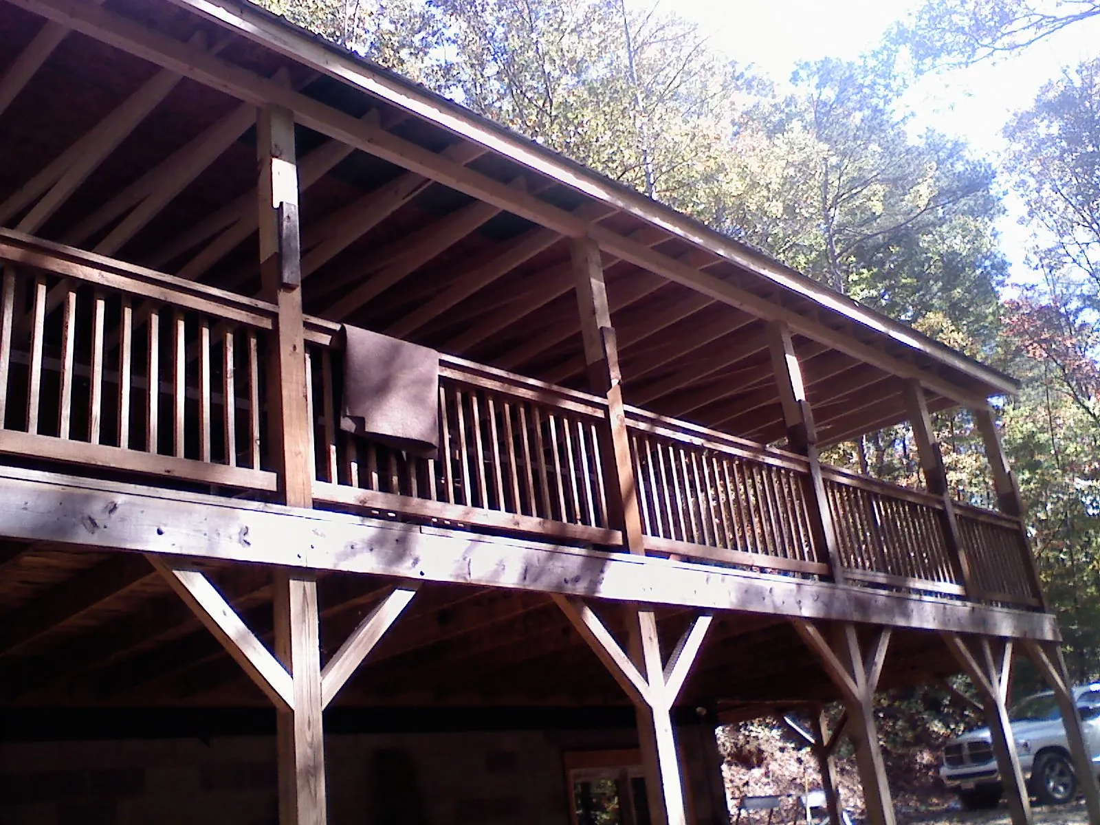 Timber framing under a new elevated porch and deck — Roof Leak Repair in Flagler Beach by Roofing Brothers